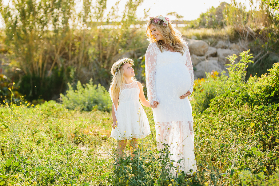 A maternity photography session in california with mother daughter their horse and a creek
