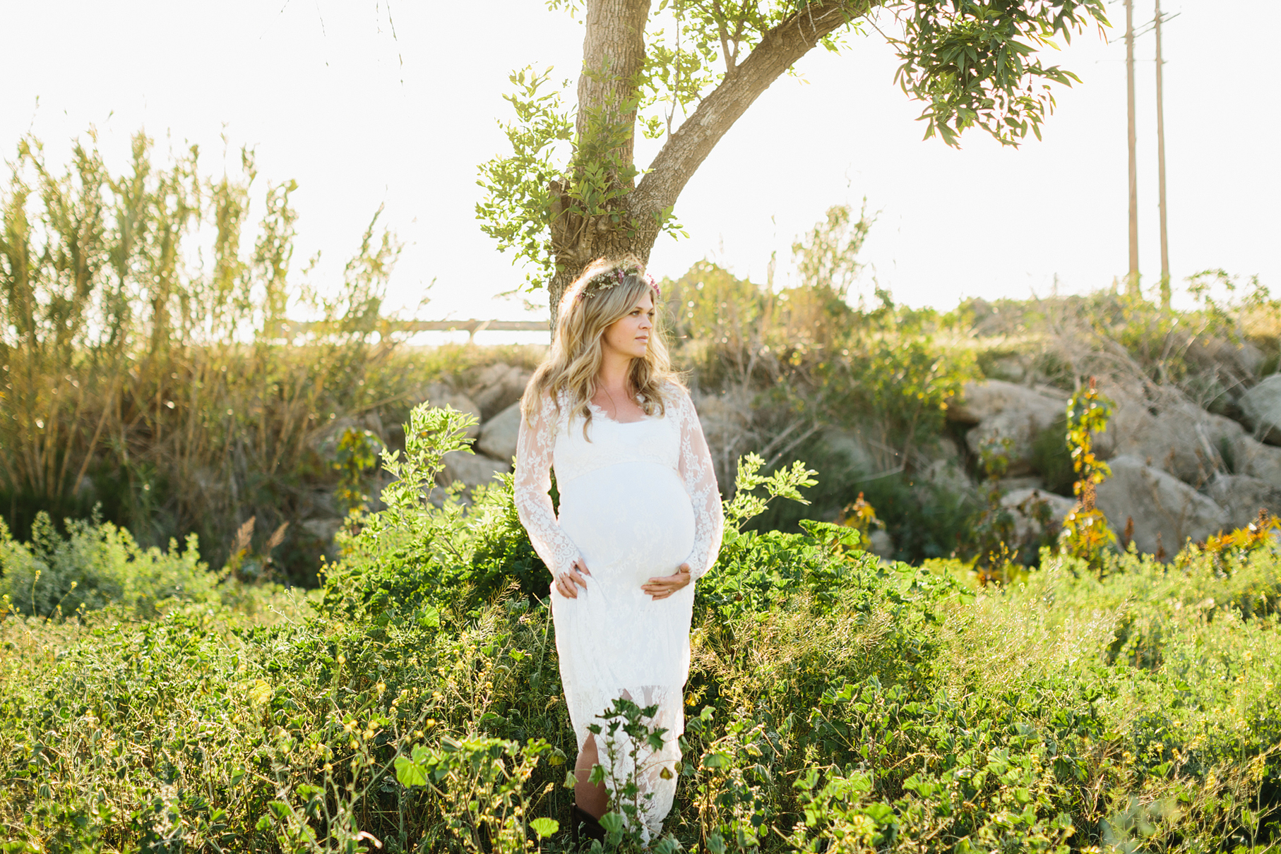 A maternity photography session in california with mother daughter their horse and a creek