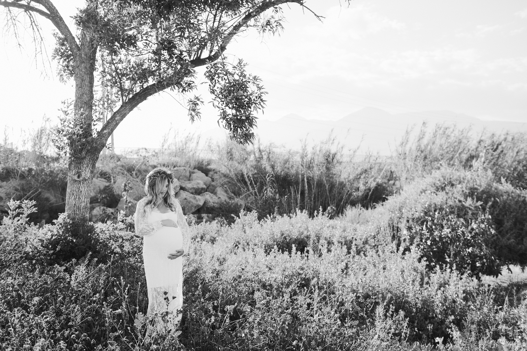 A maternity photography session in california with mother daughter their horse and a creek