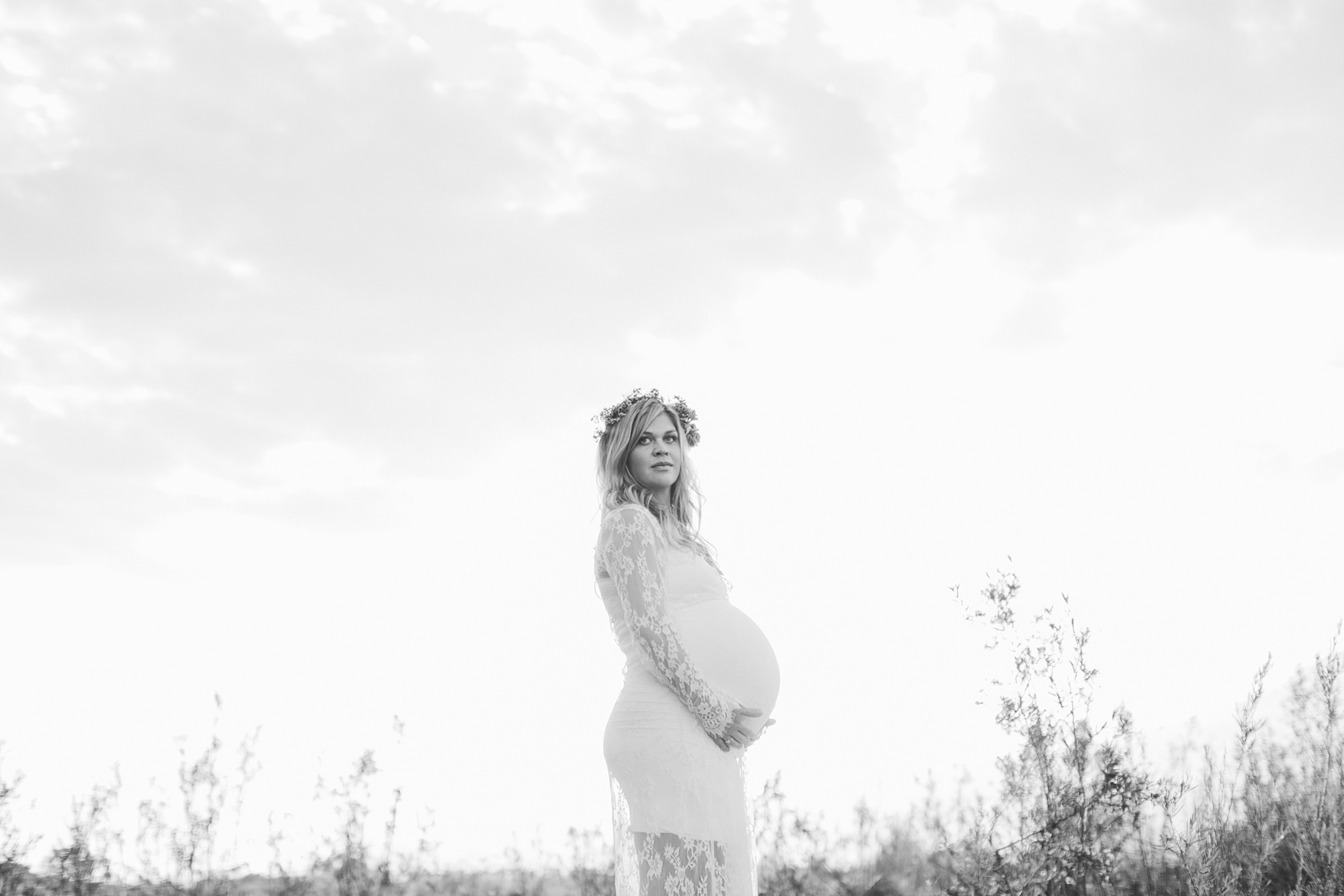 A maternity photography session in california with mother daughter their horse and a creek